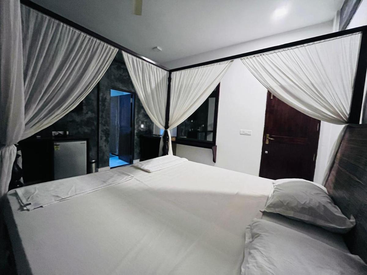 Naga Cottages Morjim Extérieur photo