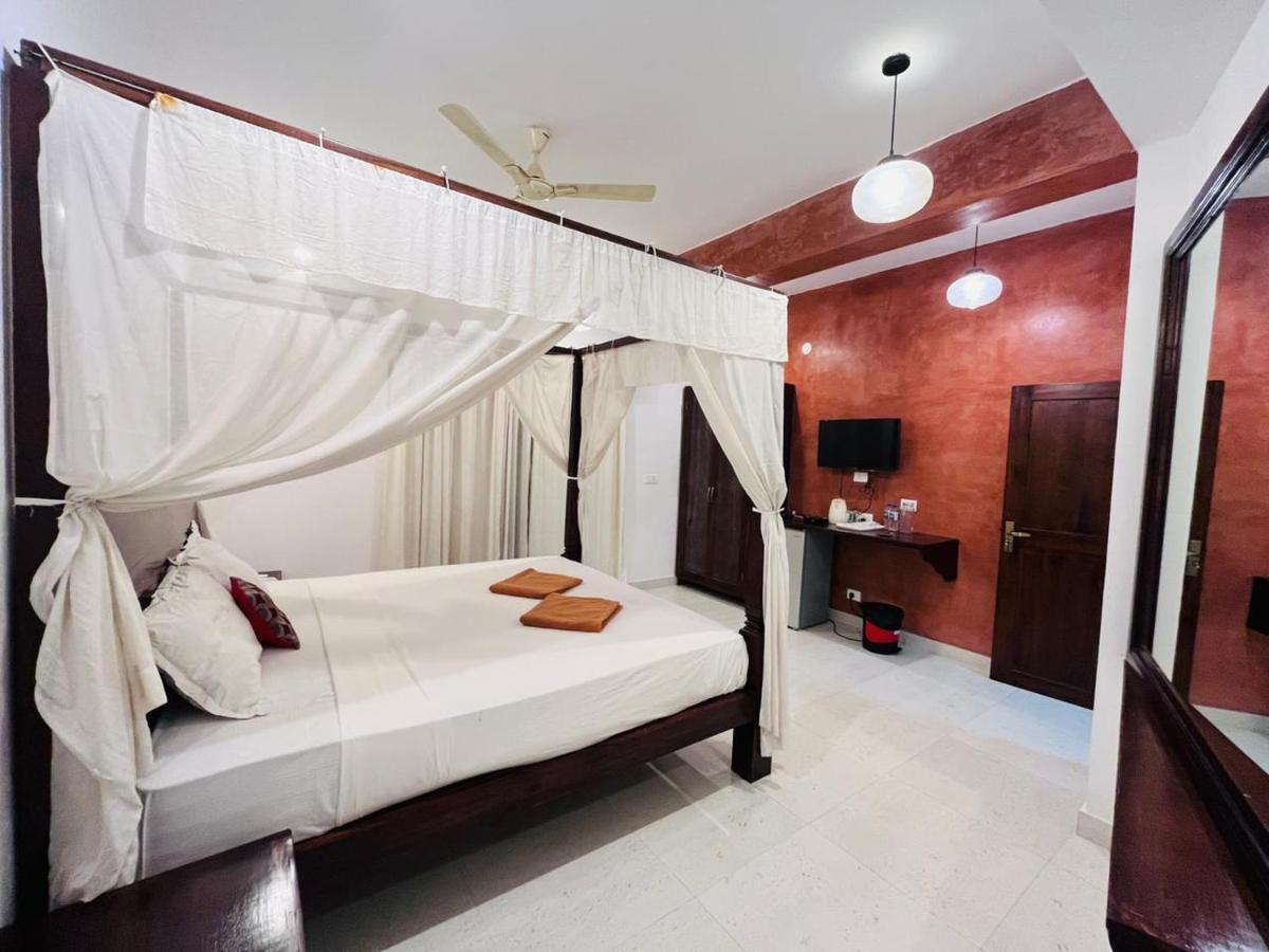 Naga Cottages Morjim Extérieur photo