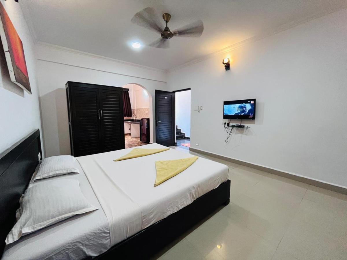 Naga Cottages Morjim Extérieur photo