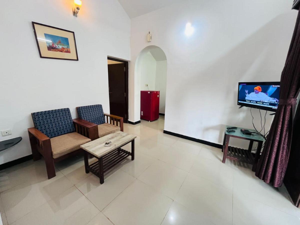 Naga Cottages Morjim Extérieur photo