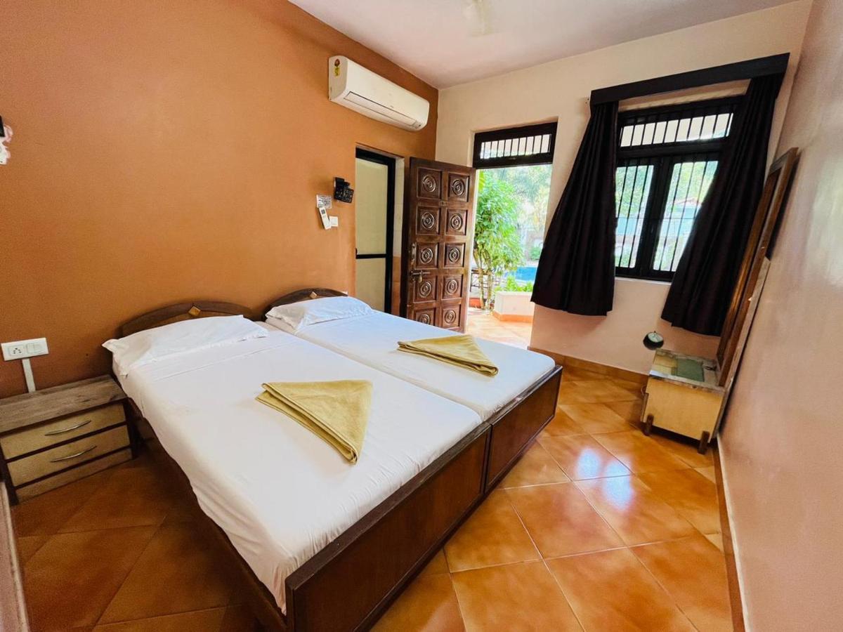 Naga Cottages Morjim Extérieur photo