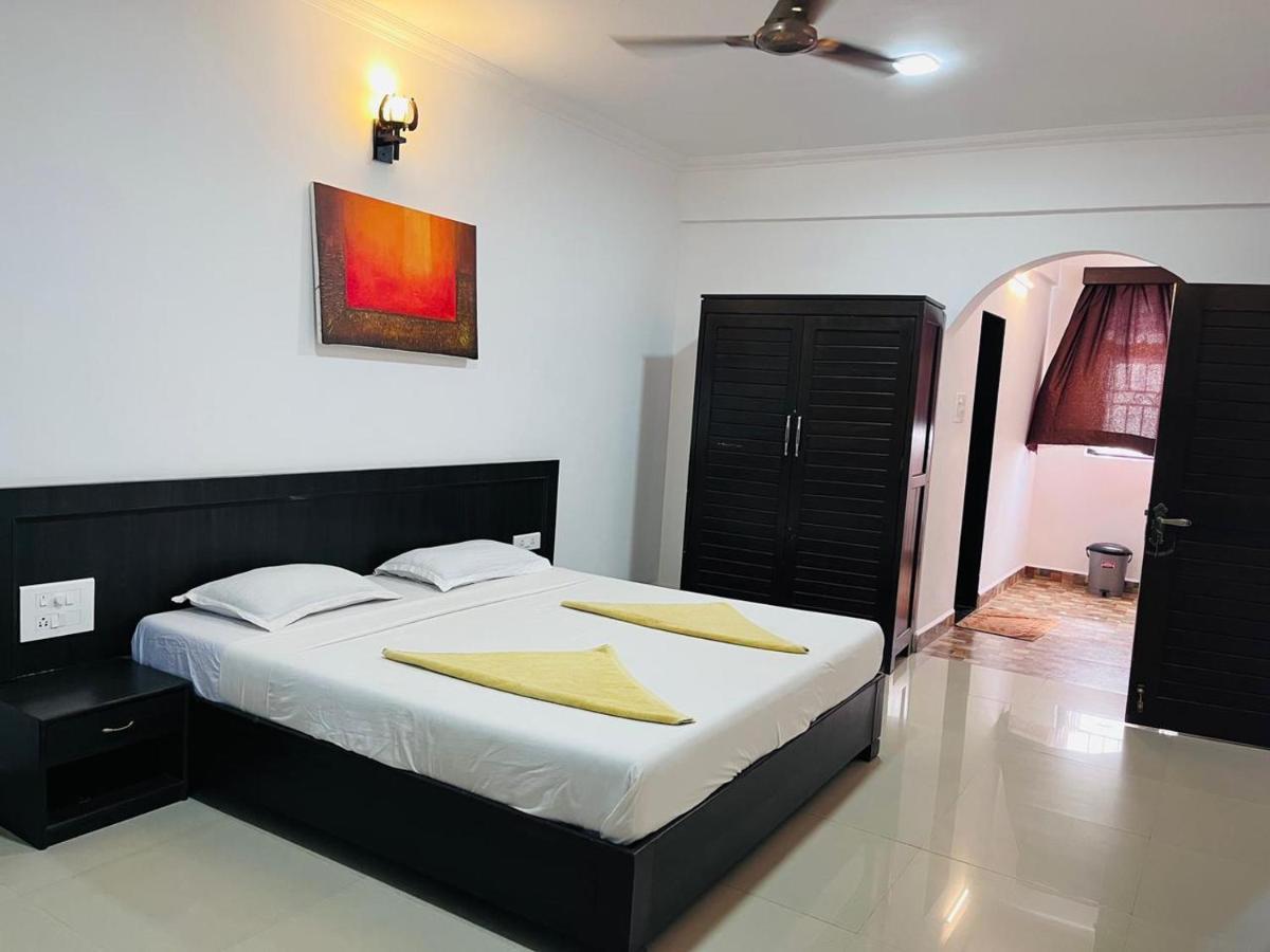 Naga Cottages Morjim Extérieur photo