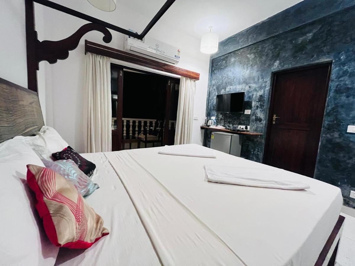 Naga Cottages Morjim Extérieur photo