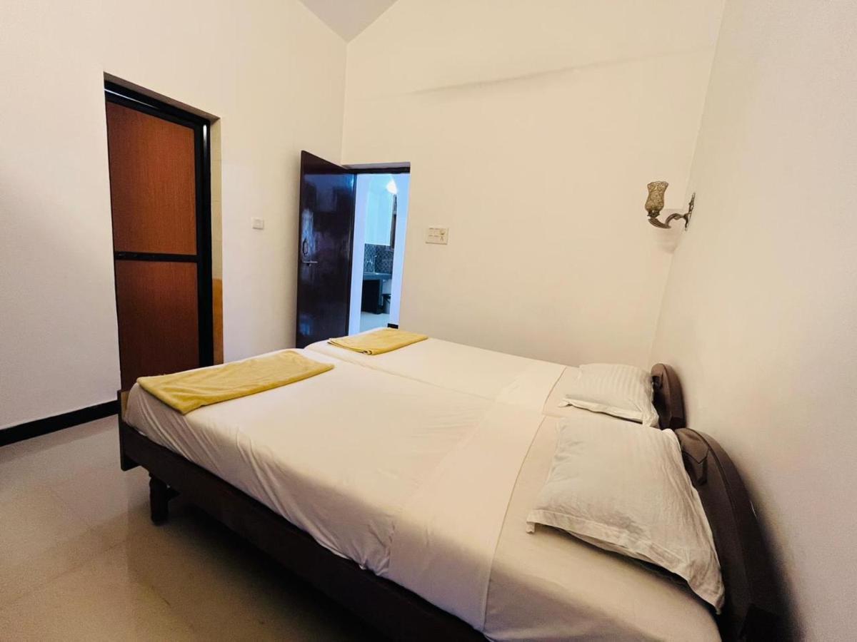 Naga Cottages Morjim Extérieur photo