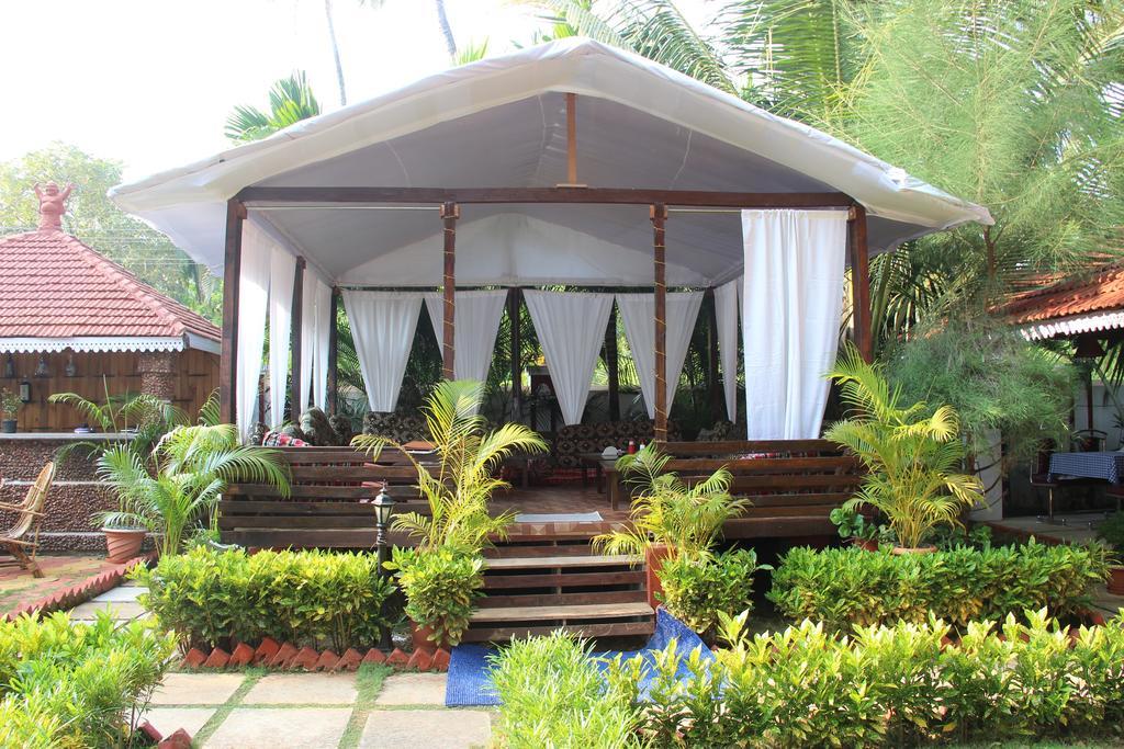 Naga Cottages Morjim Extérieur photo