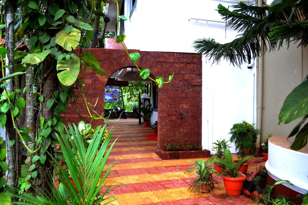Naga Cottages Morjim Extérieur photo