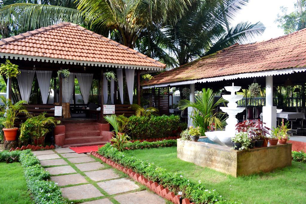 Naga Cottages Morjim Extérieur photo