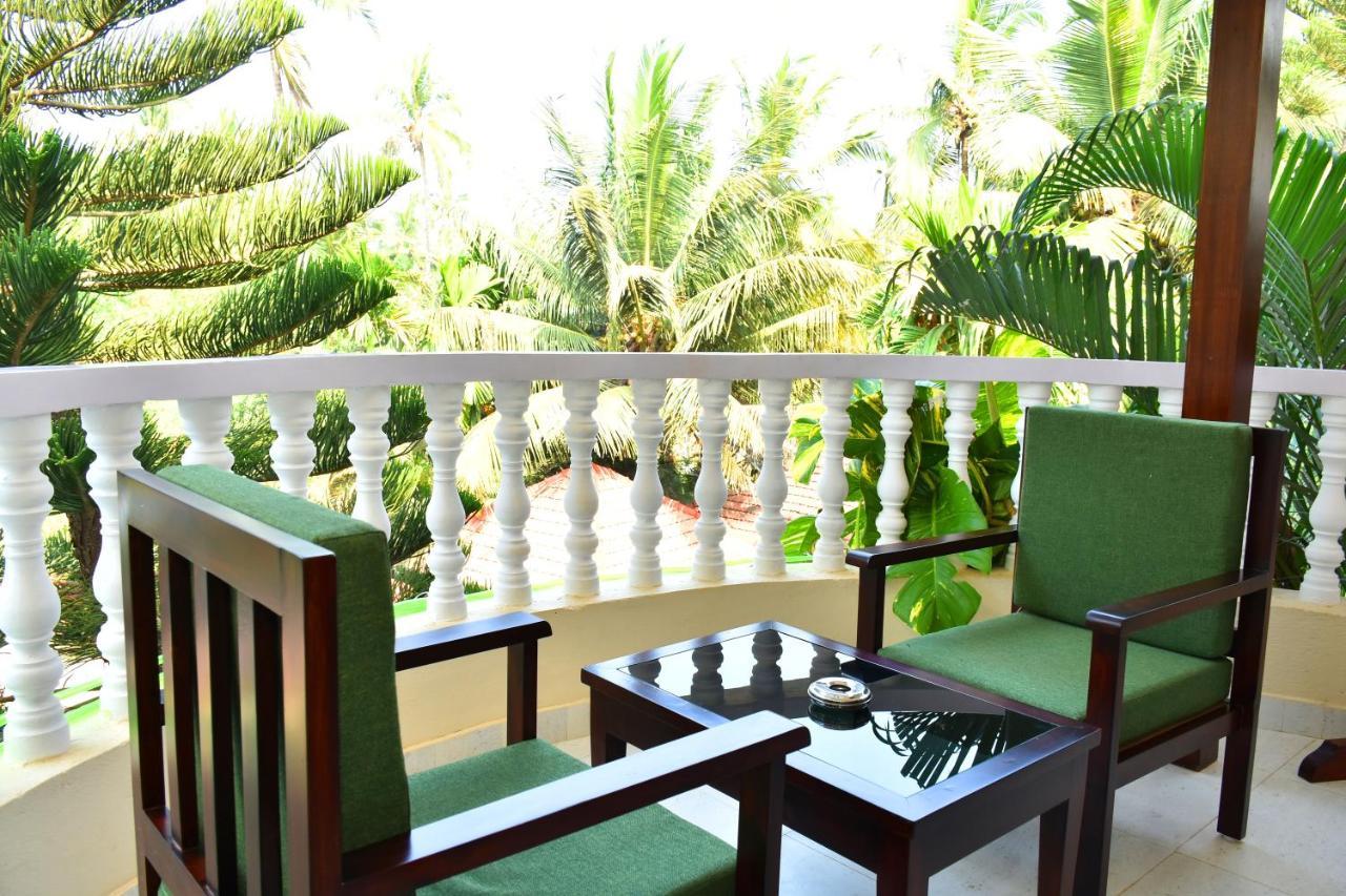 Naga Cottages Morjim Extérieur photo
